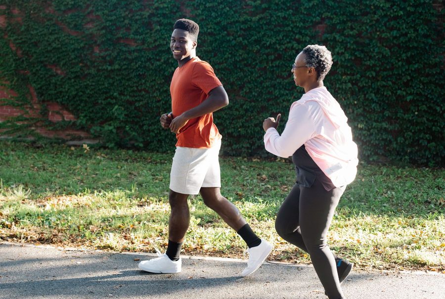A couple jogging together outdoors